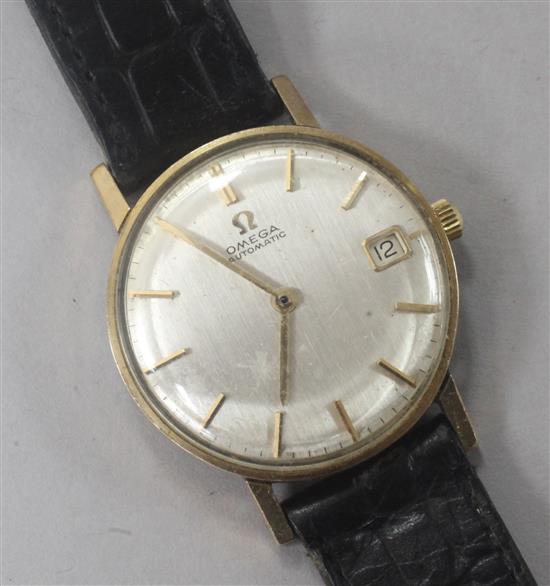 A gentlemens 1960s 9ct gold Omega automatic wrist watch with date aperture,